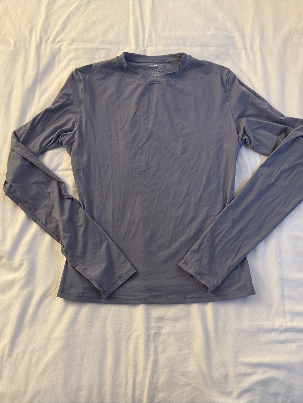 Skims long sleeve shirt in size M
